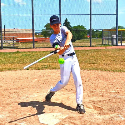 youth player using Swingrail swing trainer and training bat