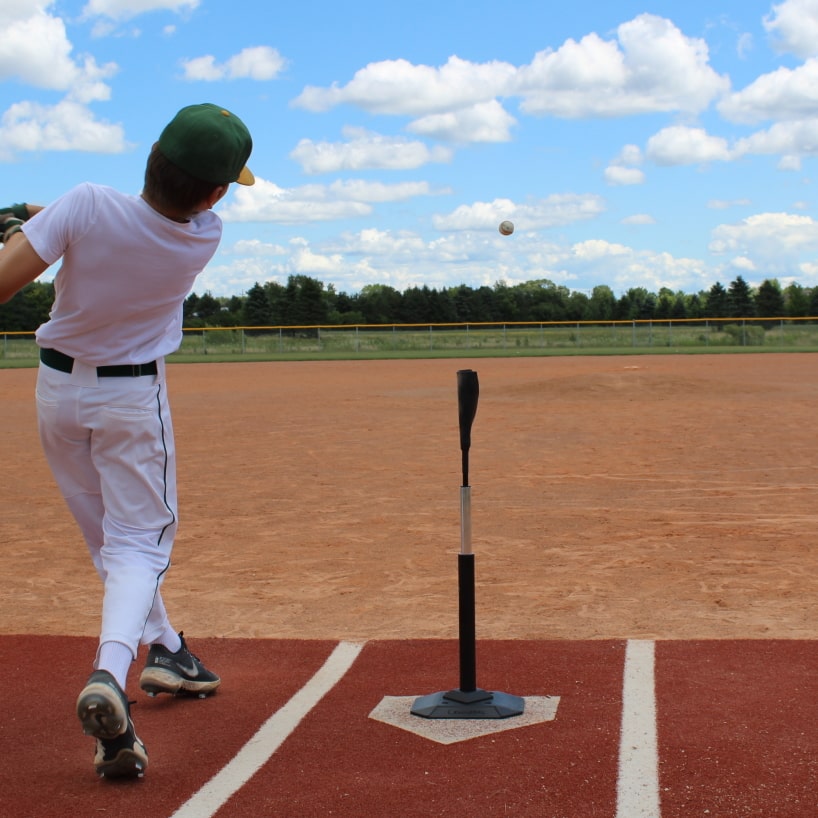 pro batting tee shown with baseball player