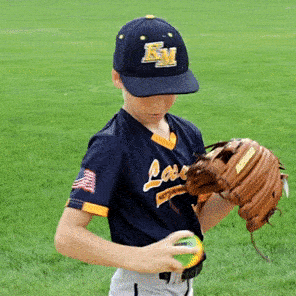 young male player throwing stoplight throwing mechanics training ball